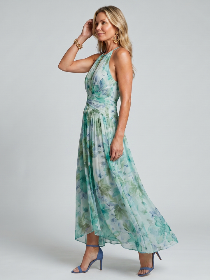 Portia | Plissiertes Halterkleid mit weichem Blumenmuster in Midi-Länge